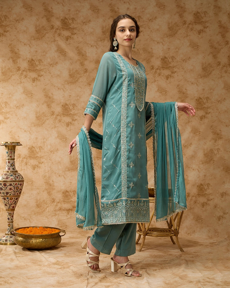 Round neck straight kurta SKD set featuring elegant placement embroidery.