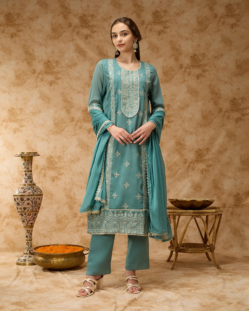 Round neck straight kurta SKD set featuring elegant placement embroidery.
